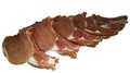 Photo of isolated pork tenderloin on a rib cut into pieces on a board on a white background