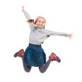 Photo of joyful little girl jumping