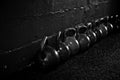 Kettlebells on the floor in a crossfit gym B/W