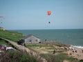 Photo Kite flying Skydiving over west bay Dorset Royalty Free Stock Photo