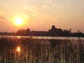 Photo with landscape background of sunset on the lake with the perspective of Trakai castle in Lithuania Royalty Free Stock Photo