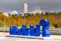 Photo landscape of the city of Madrid. Letters in blue next to the bear and the strawberry tree decorating a park.