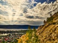 Photo landscape Volga river with a steep slope in the foreground and the village below, and the Zhiguli mountains in the distance Royalty Free Stock Photo