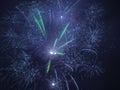 Photo A large number of bright blue fireworks in the dark blue sky Royalty Free Stock Photo