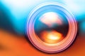 Photo lens on blurred colorful background