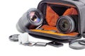 Photo lenses in open camera bag and some photo accessories Royalty Free Stock Photo