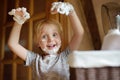 Photo of little child playing with shaving foam