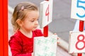 Little girl playing on the playground Royalty Free Stock Photo