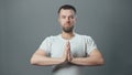 Photo of meditating young man with beard Royalty Free Stock Photo