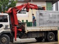 Photo of lorry crane operator.