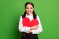 Photo of lovely cute small schoolkid lady in front of blackboard hold embrace paper red heart figure fantasize amourous