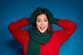 Photo of lovely pretty excited young girl hands head open mouth amazed look receiving gift boyfriend wear red pullover Royalty Free Stock Photo