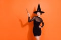 Photo of lovely young lady wave magic stick wear stylish halloween witch black hermione granger costume on