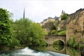 The rocky fortification in Luxembourg City and bridge over Alzette river.