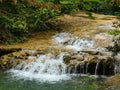 Magnificent landscape of a charming little waterfall of the Bresque river surrounded by verdant nature in Sillans-la-cascade in Royalty Free Stock Photo