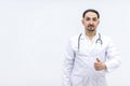 Photo of male mature doctor posing at camera with a stethoscope. Royalty Free Stock Photo
