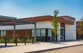 Photo of the mall shopping street in North America. Exterior of a new shopping centre building. Mall complex outdoor Royalty Free Stock Photo