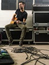 Playing guitar in the rehearsal studio Royalty Free Stock Photo