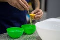 Photo of a man separating eggs Royalty Free Stock Photo