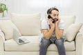 Photo of man talking over the phone with positive espression. Royalty Free Stock Photo