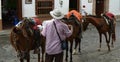 Photo of man and three horses in Santafe de Antioquia, Colombia