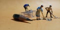 Close up Photo 2 man and 1 woman cleaning trash from pencil sharpener with negative space Royalty Free Stock Photo