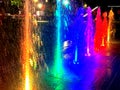 Many Rich Colorful Water Fountain Jets at Night Royalty Free Stock Photo