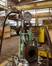 Photo of a marine engine exhaust valve during a pressure test at Gdansk shipyard workshop. Poland