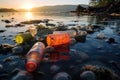 Plastic Bottles and Microplastic Waste Floating in a Lake Near the Shore Beach Environmental Landscape Royalty Free Stock Photo