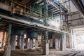 Photo of a massive industrial complex with a maze of pipes and machinery