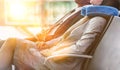 Mature businessman and young attractive businesswoman sleeping while waiting for boarding in their gate at airport Royalty Free Stock Photo