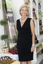 Portrait of mature female shop owner smiling