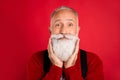 Photo of mature man happy positive smile hands touch beard barber shop care isolated over red color background