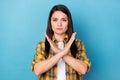 Photo of mature woman serious crossed hands refuse prohibition decline isolated over blue color background