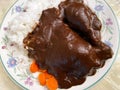 Chicken Drenched in Brown Mole Sauce