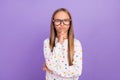 Photo of minded thoughtful small lady finger chin think wear specs dotted nightwear isolated purple color background
