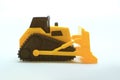 Photo of a miniature bulldozer as a tool to introduce development equipment to children in school Royalty Free Stock Photo