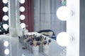 Photo of the mirror in the make-up room. Large lamps near the mirror Royalty Free Stock Photo