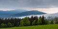 Mist flowing into the valley in Sumava