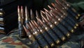 Photo of 5.56mm ammunition, machine gun bullets belt, rifle ammunition in magazines