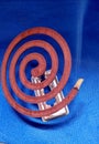 Photo of mosquito coil in blue background