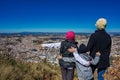 Photo with mother with daughter and son on top of the mountain watching the city Pocos de Caldas - Minas Gerais / Brazil - below