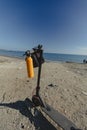 a photo of a motorized scooter on the beach