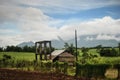 Photo of a mountain, little hut, landscape, outdoor garden, trees, grass, flowers for commercial purposes Royalty Free Stock Photo