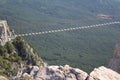 Rope bridge over the precipice on mount AI-Petri in Crimea Royalty Free Stock Photo