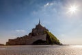 Photo of Mt St Michel in Normandy France in the afternoon with a sunstar Royalty Free Stock Photo