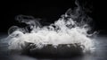 Photo of a mysterious white smoke swirling in a bowl on a table