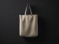 Photo natural color rubberized material bag hanging in center. Empty concrete painted black wall background.Highly