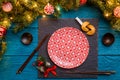 Photo of New Year branches of fir, black board, sushi sticks, prediction cookies, Royalty Free Stock Photo