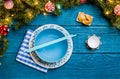 Photo of New Year branches of fir, cookies with prediction, plates, sticks for sushi Royalty Free Stock Photo